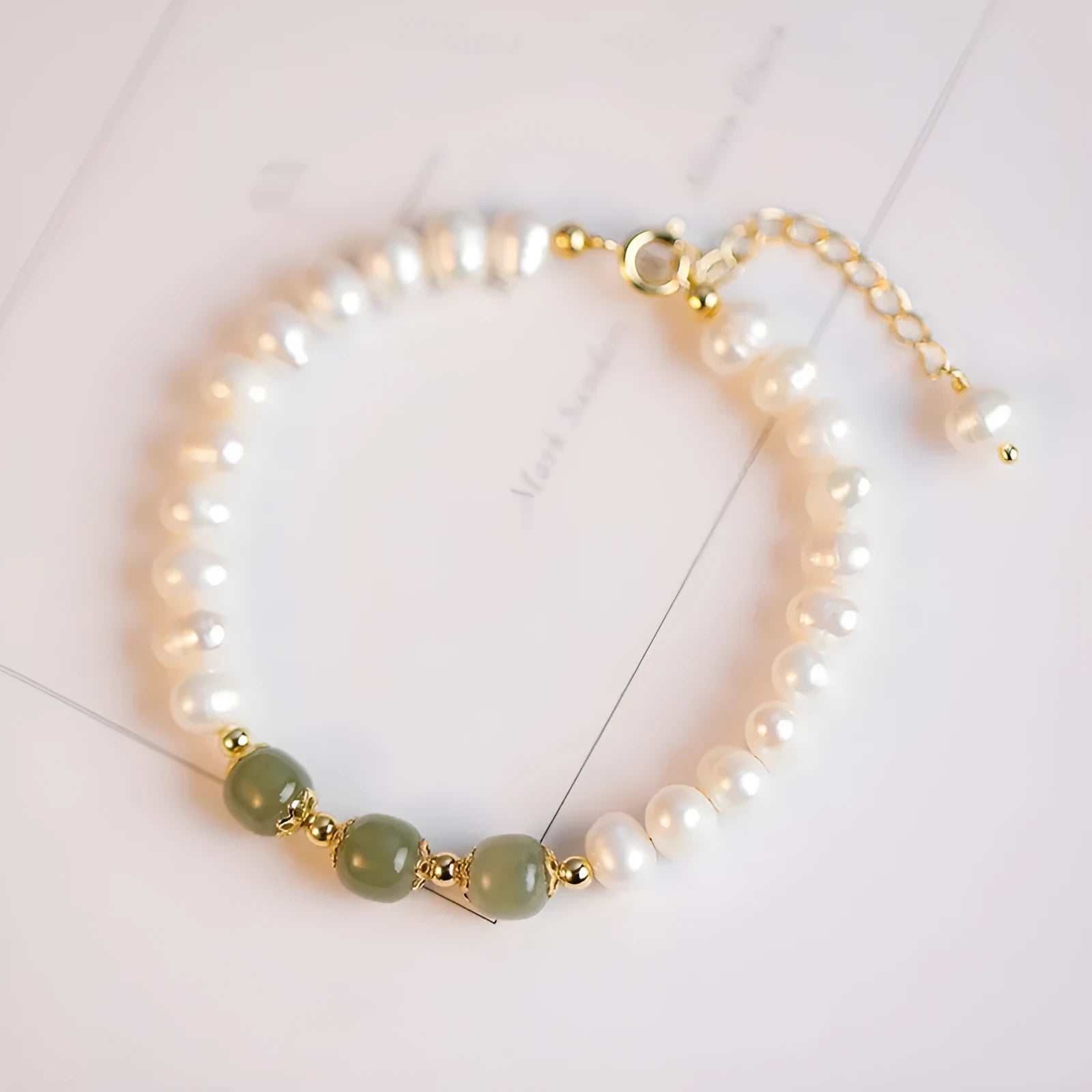 Diamond-shaped freshwater pearl bracelet with electroplated Hetian jade colour in deep or light tone options