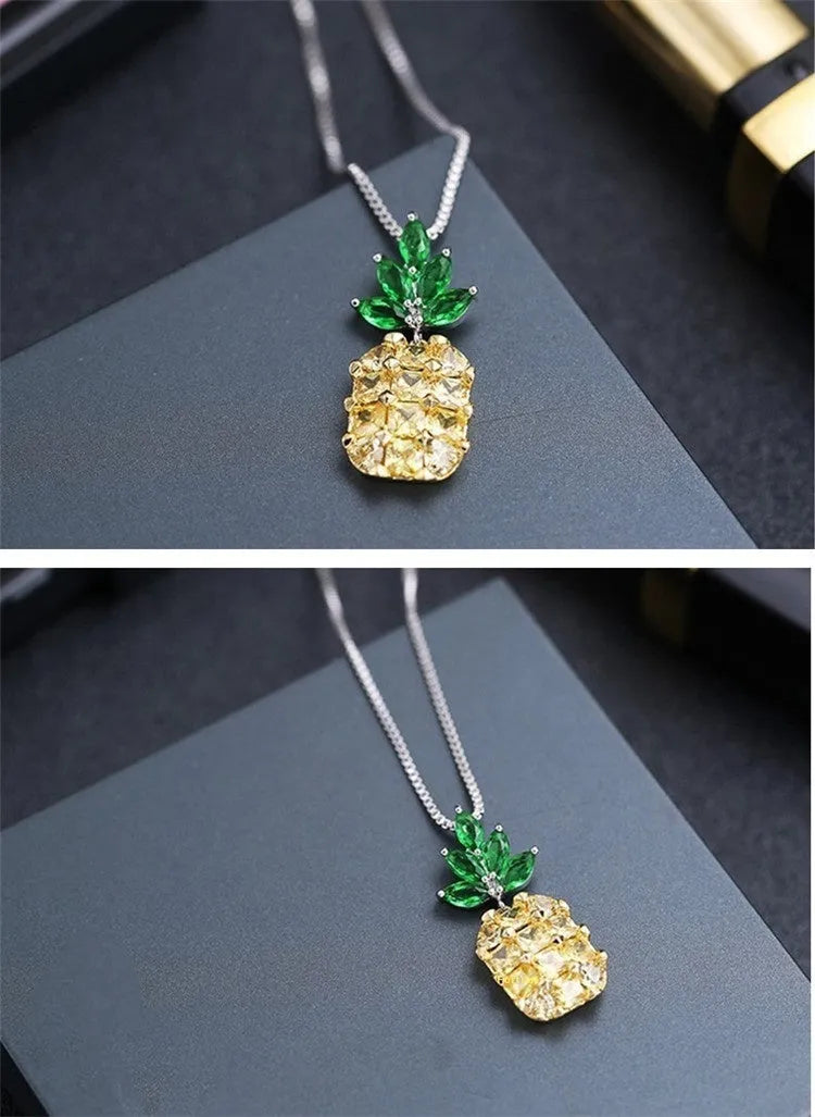 Silver geometric pineapple pendant necklace with diamond motif on chain