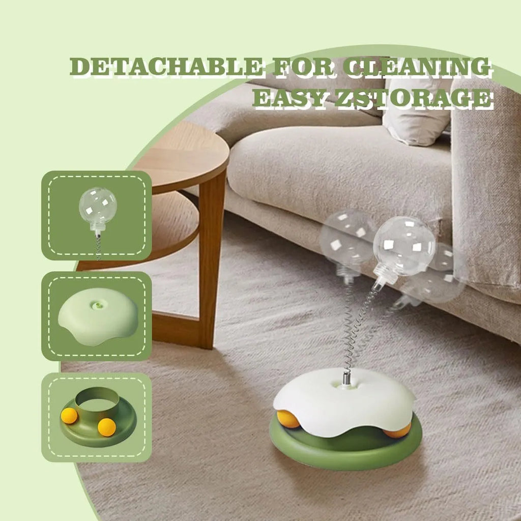 Blue and green interactive cat treat dispenser toy with track ball slow feeder design
