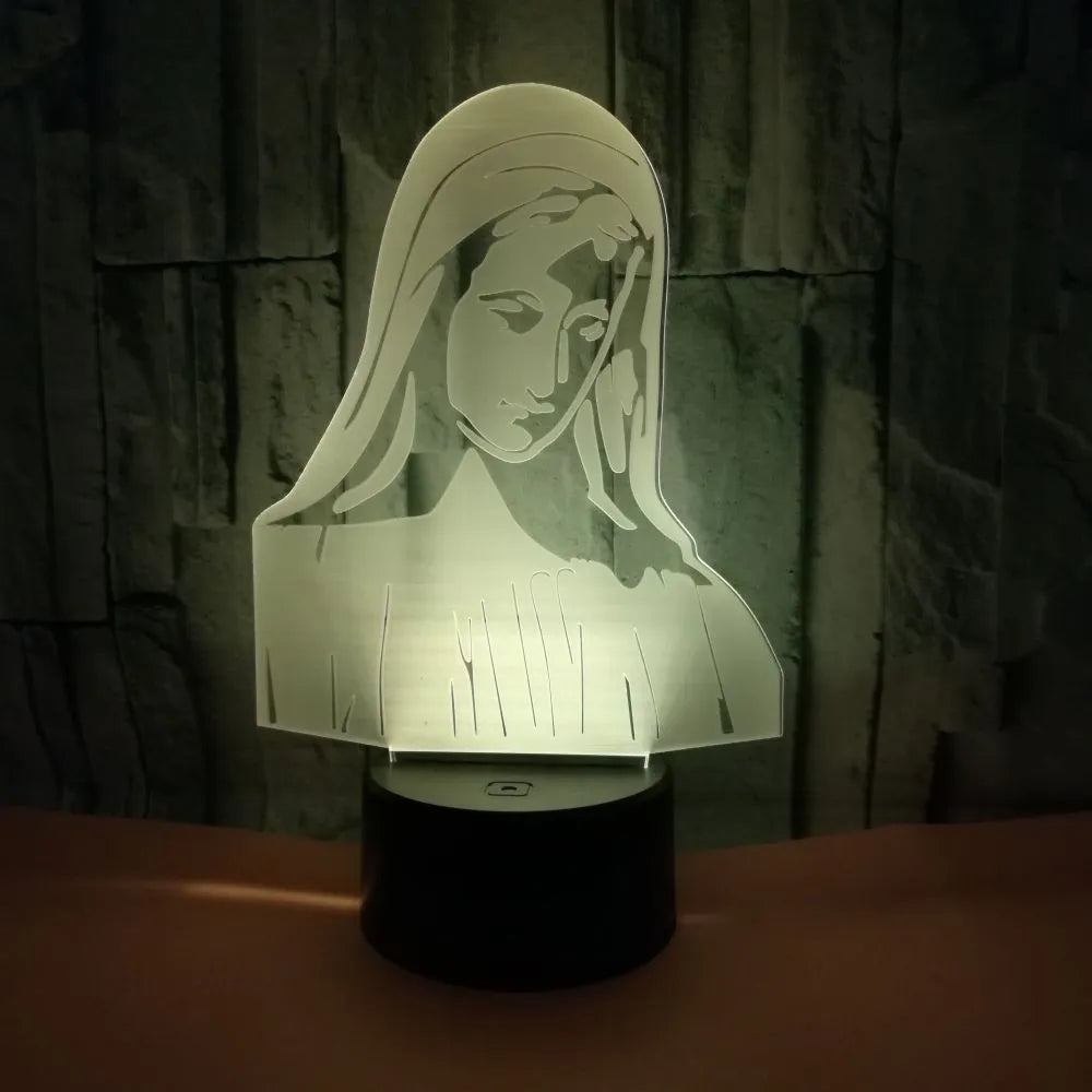 3D LED night light for kids showing laser-etched dual ring pattern with multi-colour glow on acrylic plate.