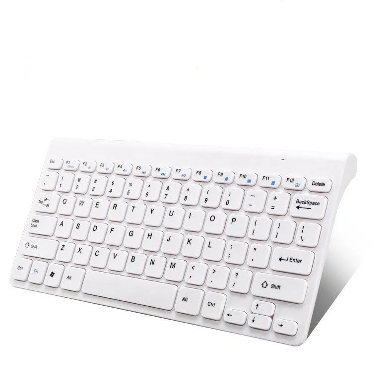 Wireless black keyboard and mouse set with 4G connectivity on wooden desk