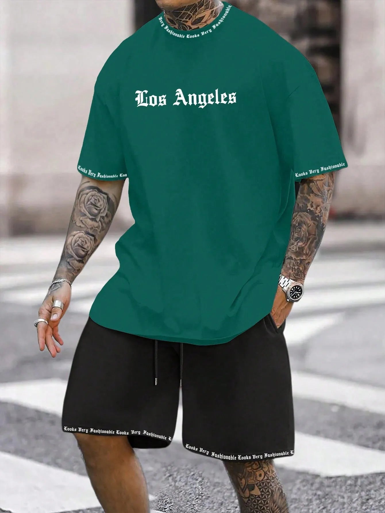 Sports-style short sleeve shirt and matching shorts set in a printed pattern, shown in colour G23P1573.