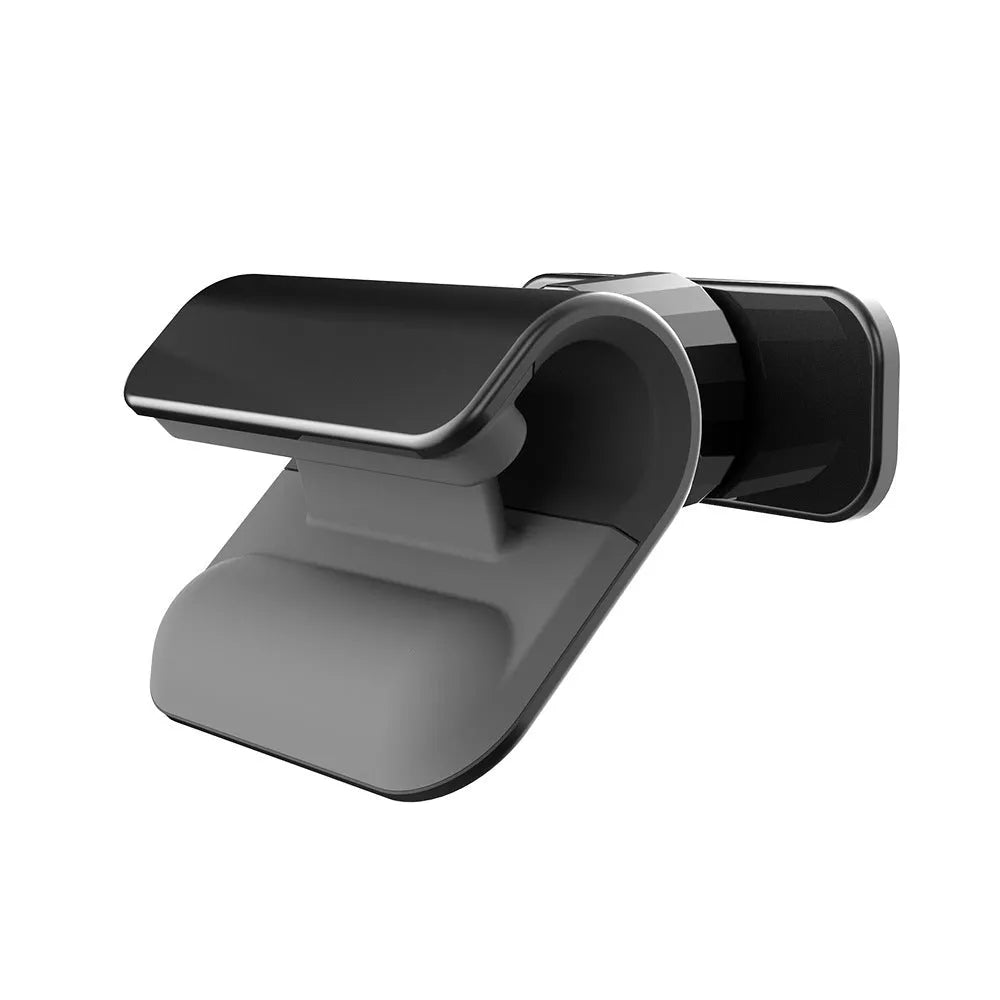 Black 360-degree rotating car phone holder mounted on a car air vent, holding a mobile phone.