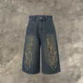 Men's cropped denim shorts with flame embroidery patch in straight leg cut