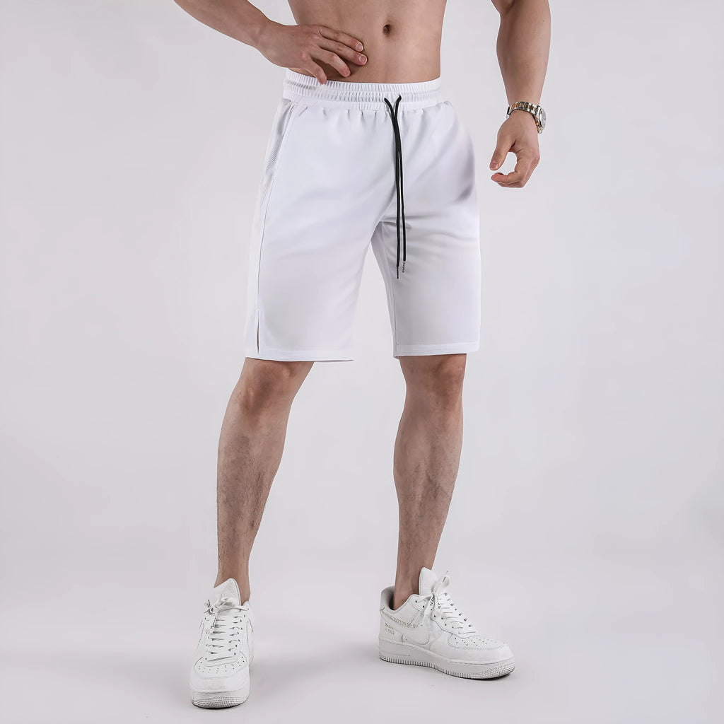 Man wearing loose black quick-drying capri pants for casual summer wear.