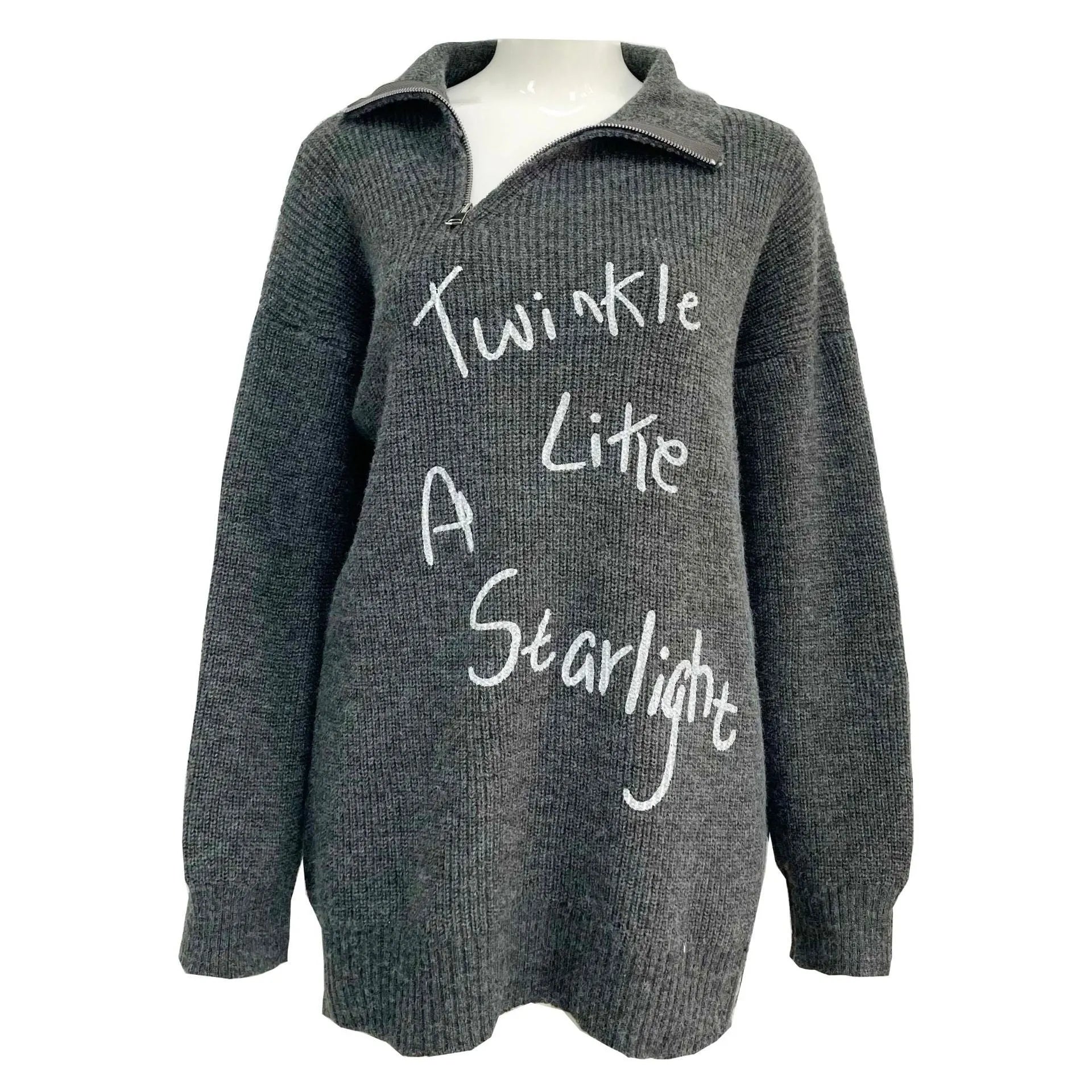 Women's light khaki alpaca fleece sweater with a turtleneck collar and diagonal front zip.