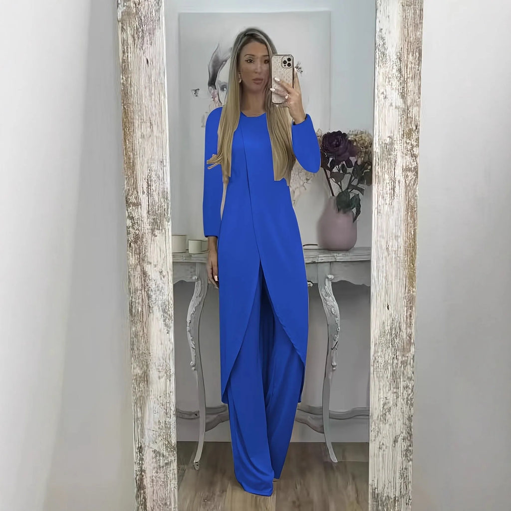 Black loose fit casual two-piece lounge set with long sleeve top and trousers on a hanger.
