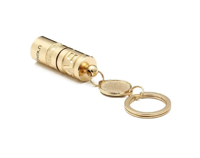 Gold zinc alloy waterproof LED flashlight attached to a key ring