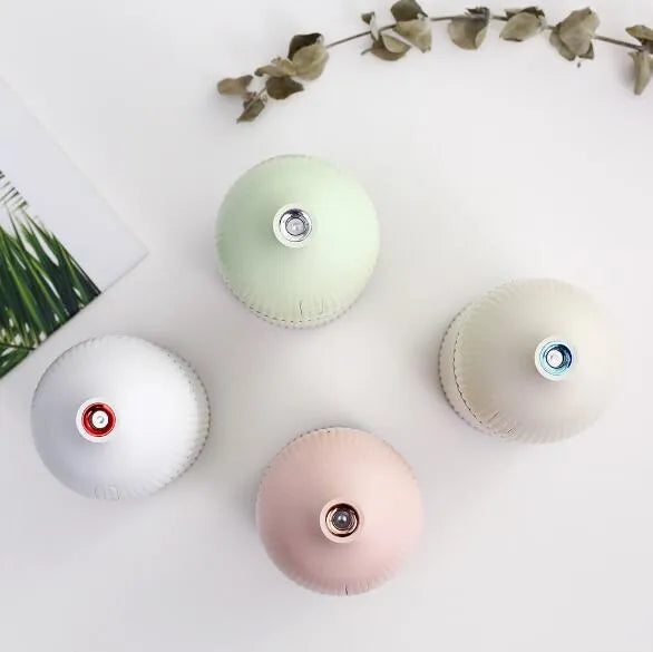 White ultrasonic aroma diffuser humidifier with LED light, measuring 80mm wide and 155mm tall.