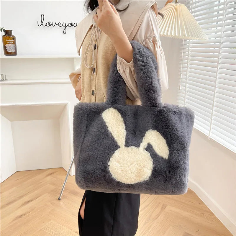 Women's plush tote bag with cartoon rabbit ears design in solid colour
