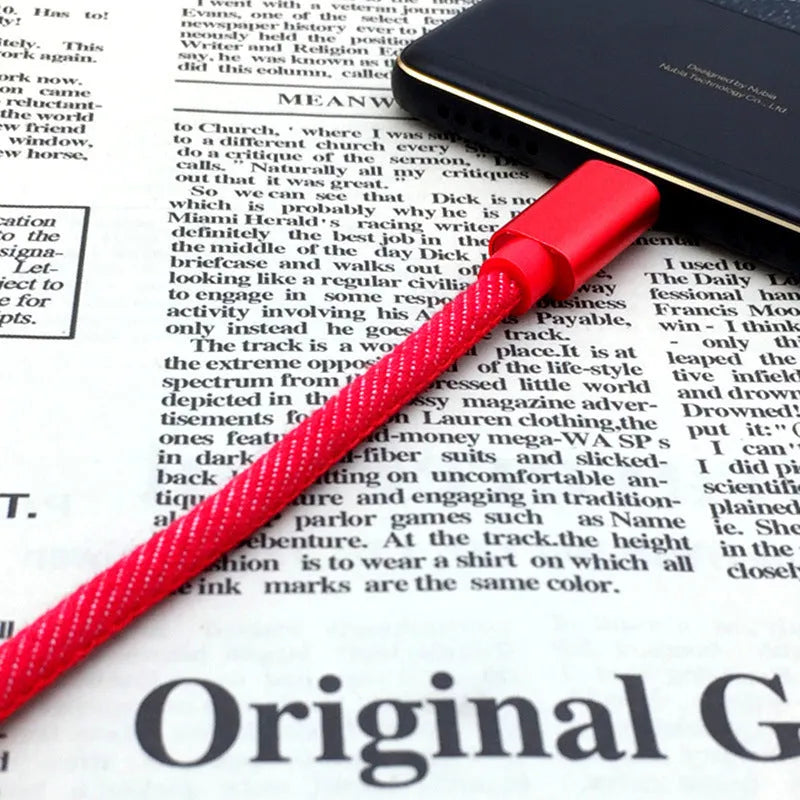 USB Type-C charging cable with blue denim fabric sleeve and aluminium connector.