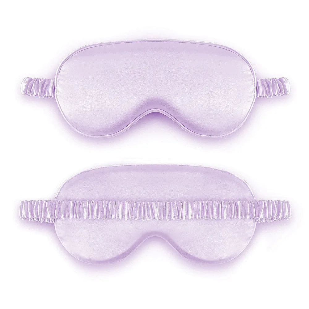Double-sided silk-like sleep mask in rayon satin, shown in multiple colour options on a white background.
