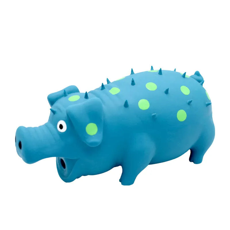 Pig-shaped blue latex dog chew toy with textured surface and squeaker for teeth cleaning