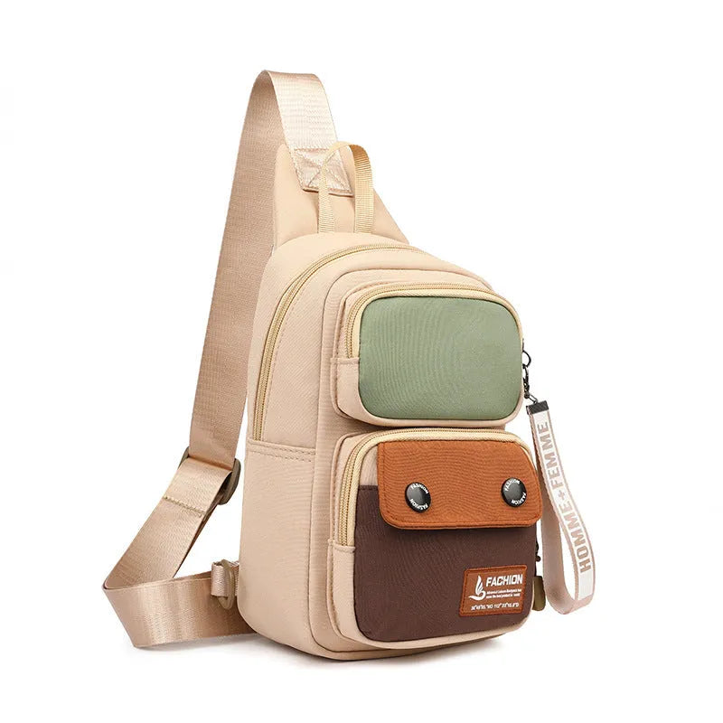 Outdoor leisure crossbody shoulder bag in nylon, shown in beige contrast colour with storage compartments.
