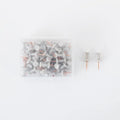 Morandi colour push pins in green, grey, and pink with three different head designs on cork board