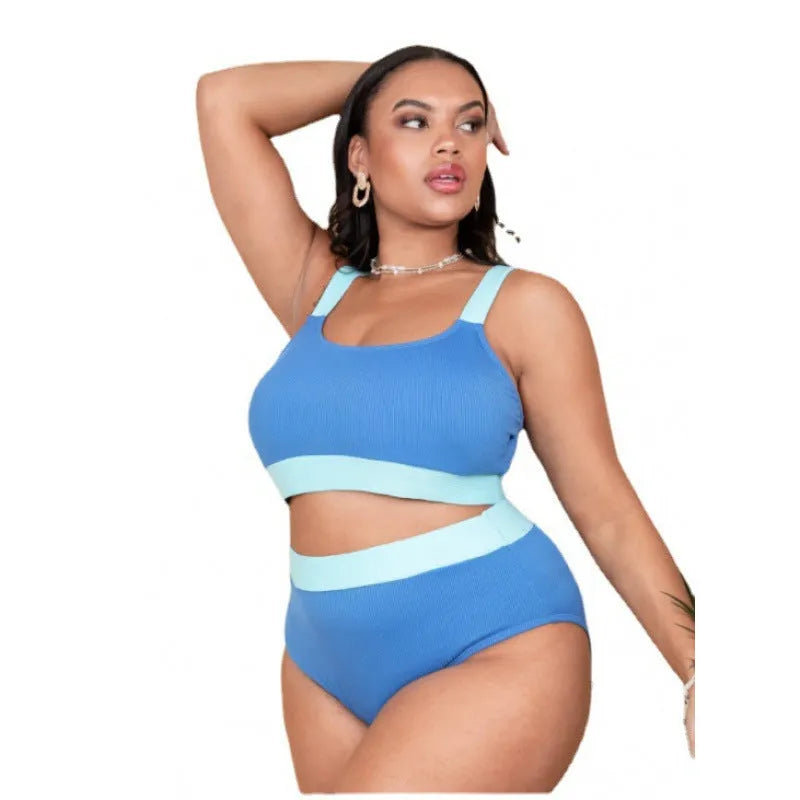 Women's high-waist polyester bikini in solid colour with stitching details, shown in extended sizes