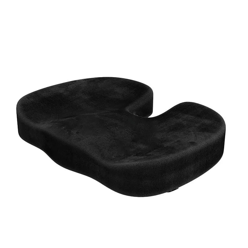 Black U-shaped memory foam seat cushion with removable flannel cover, shown on a office chair.