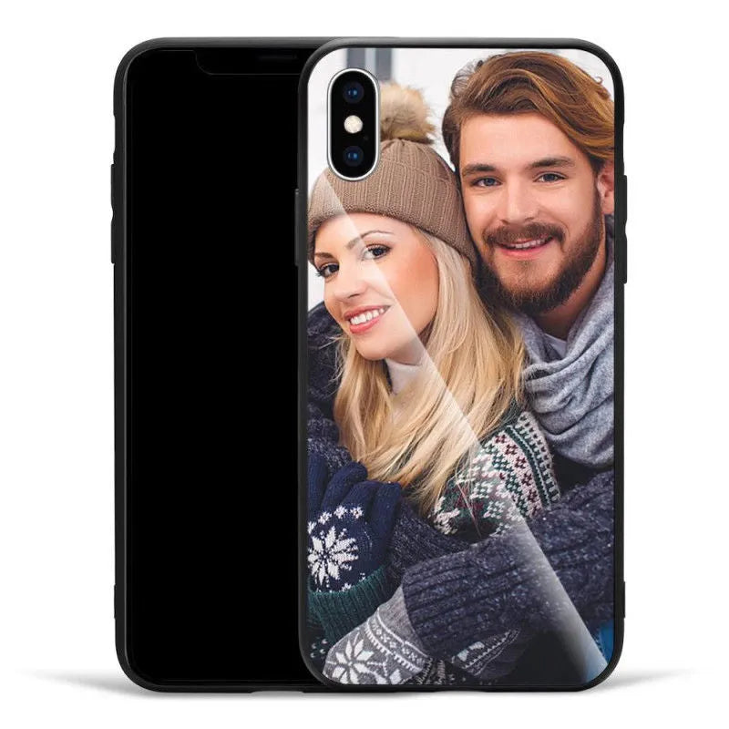 Patterned iPhone case with raised edges on a table next to an iPhone.