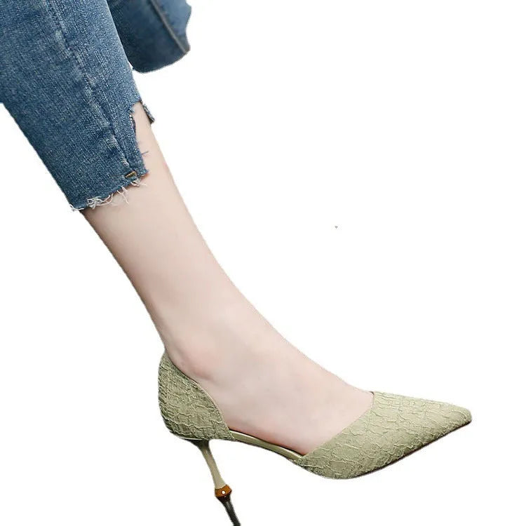 Women's black pointed toe stiletto high heels with a plain PU leather upper.