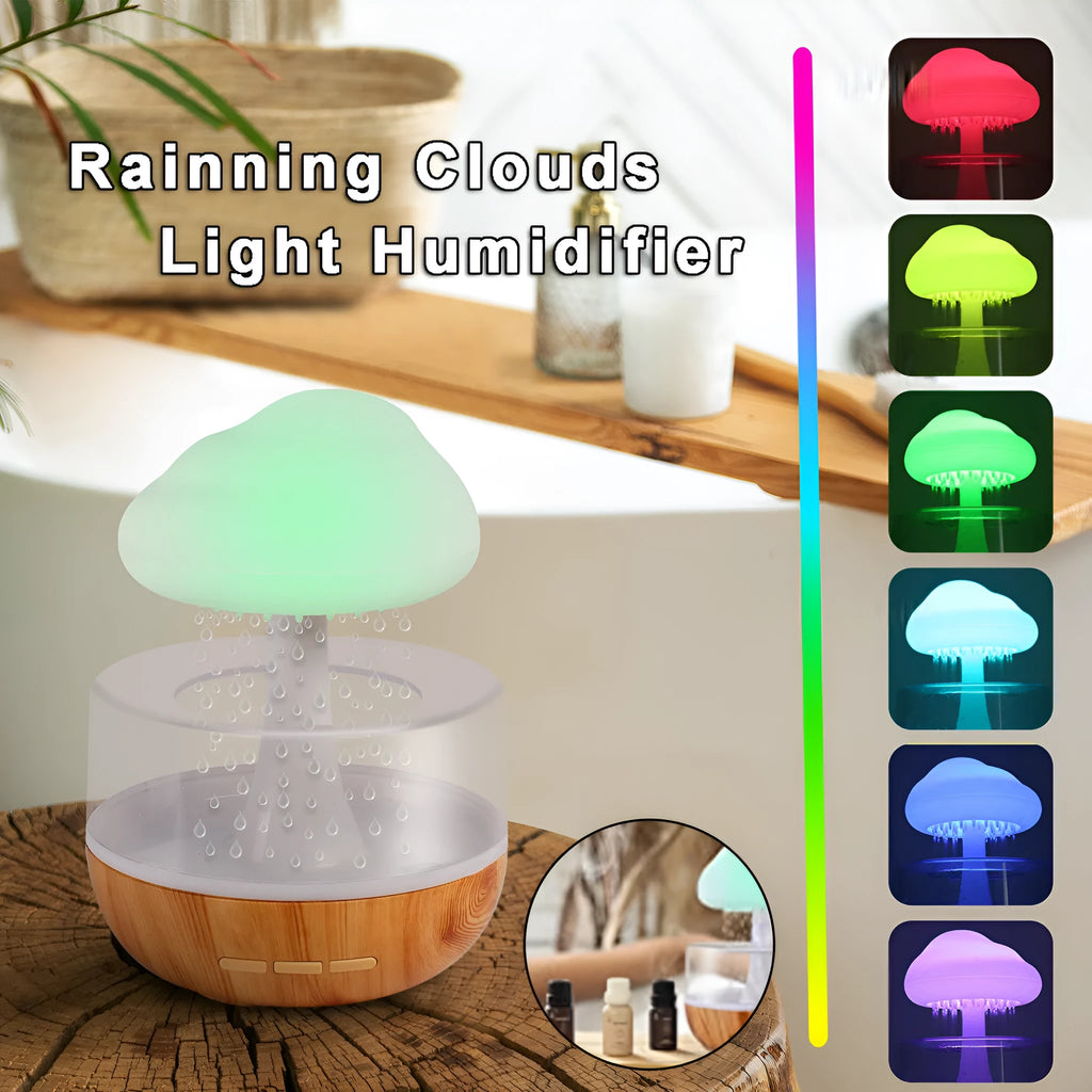 White cloud-shaped humidifier with night light and water flow display on wooden surface