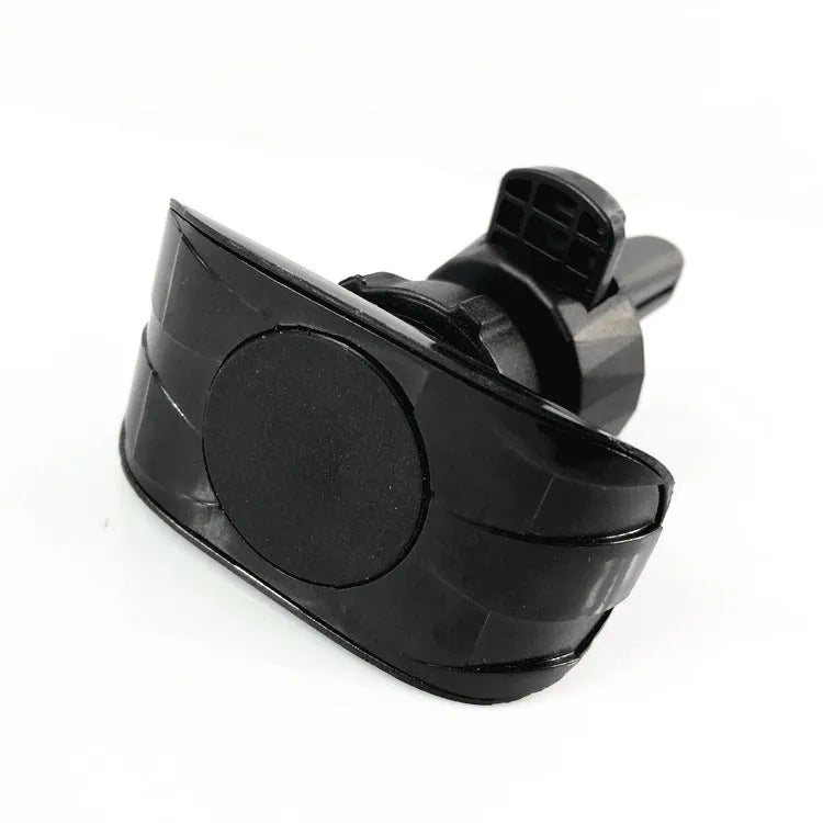 Black car phone holder clipped onto vehicle air vent with phone securely mounted