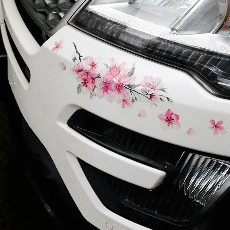Two sizes of pink cherry blossom flower car sticker on a white background.
