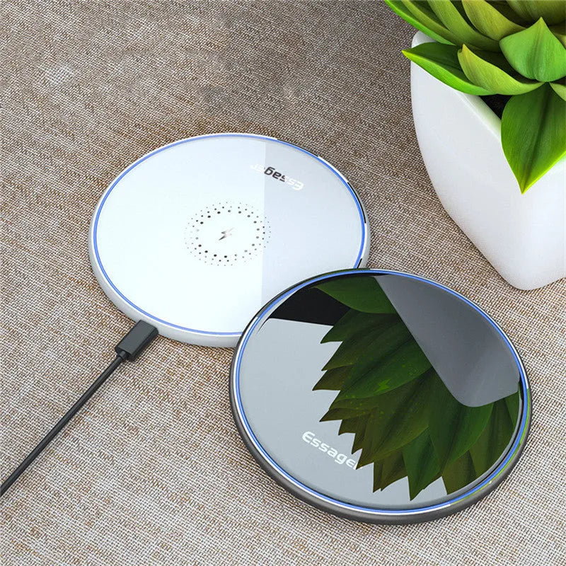 Black and white aluminium alloy wireless charging pad for phones with Qi fast charging and LED light.