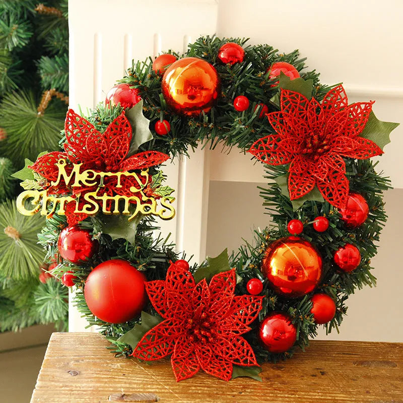 Multicolour plastic Christmas wreath with a 30cm diameter, hung on a door.