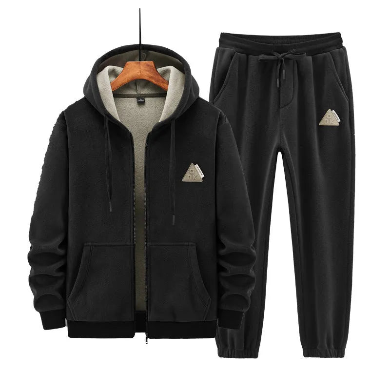 Men's grey hooded sports sweater and matching trousers laid flat.