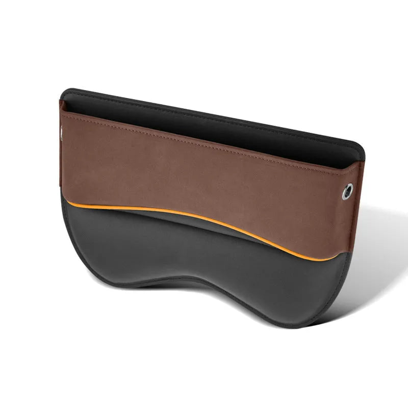 Black PU leather car seat storage box placed on a vehicle seat.