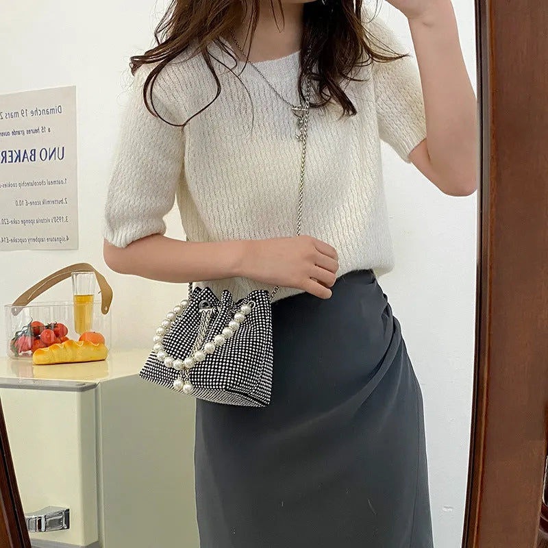 Diamond detailed PU leather crossbody bag with chain strap in bucket shape design