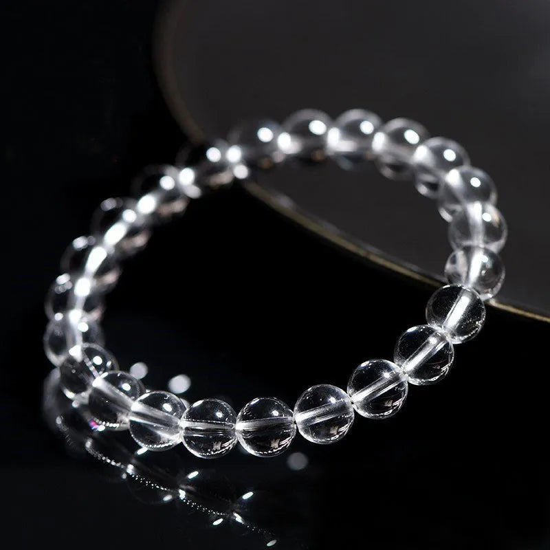 Natural Donghai old materials crystal bracelet with white water round beads in a geometric unisex design.