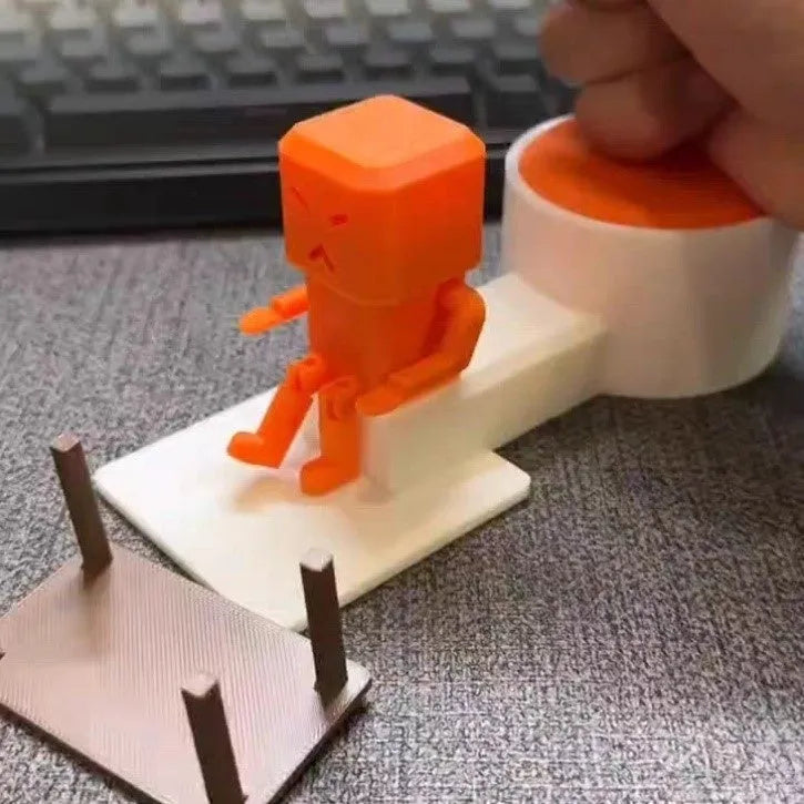 Orange plastic table turning decompression toy for desk stress relief