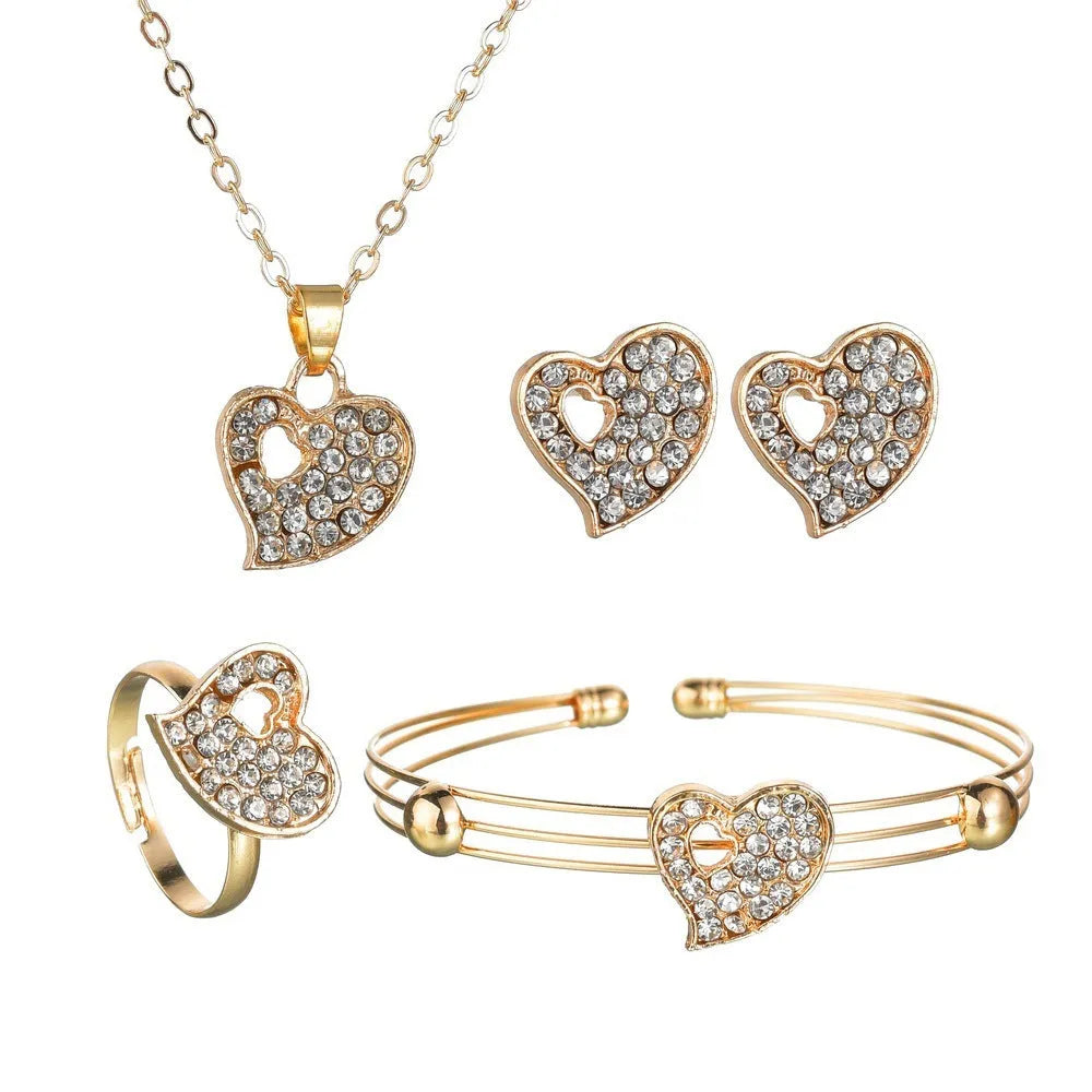 Gold-colour alloy jewellery set with love, water drop and bell patterns including earrings, decorative items and hand ornaments