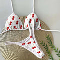 Women's briefs-style bikini swimsuit in a printed pattern, made from nylon with a cotton lining.