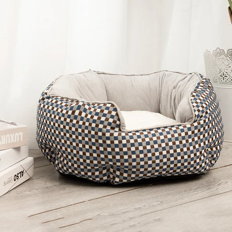 Blue octagonal pet bed with raised sides and a removable mat, for a small dog or cat.