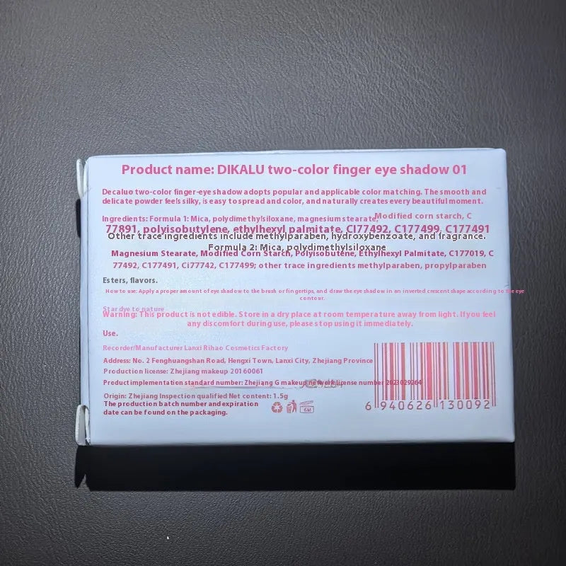 Two-tone eye shadow cosmetic plate showing matte and shimmer sections in pink and black colour combination