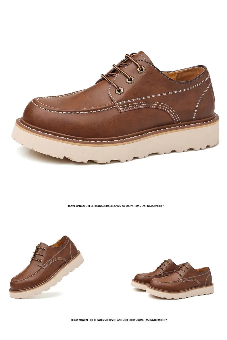 Men's black low-top Martin boots with a round toe and non-slip rubber sole on a plain background.