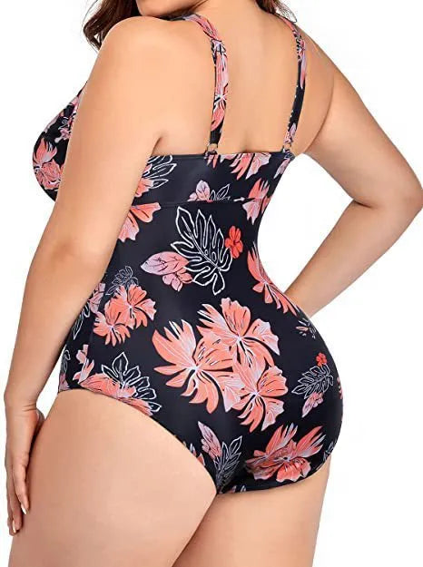 Black printed plus-size bikini swimsuit for women on a hanger.