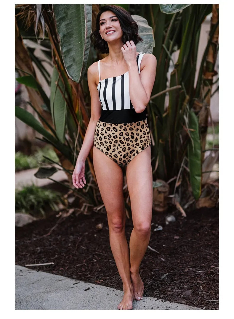 Women's leopard print high waisted one-piece swimsuit with an asymmetric collar design.