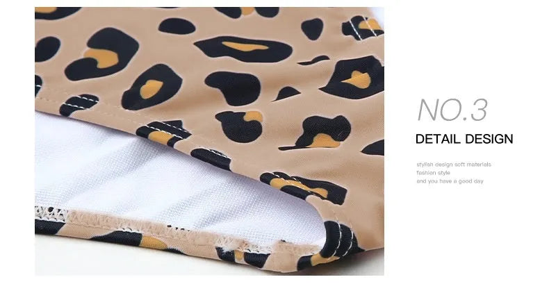 Women's leopard print high waisted one-piece swimsuit with an asymmetric collar design.
