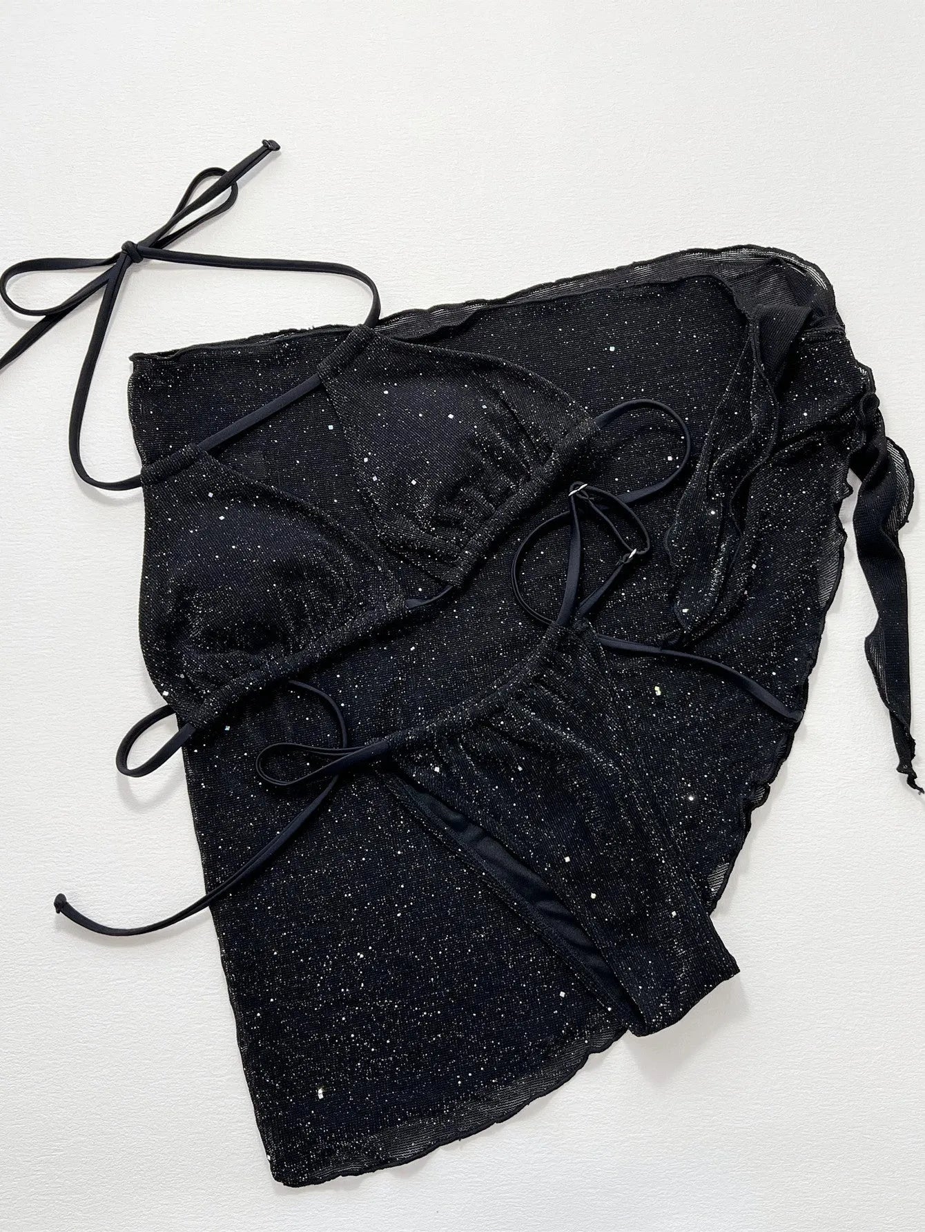 Black three-piece bikini swimsuit set with polyester fabric top and matching shorts