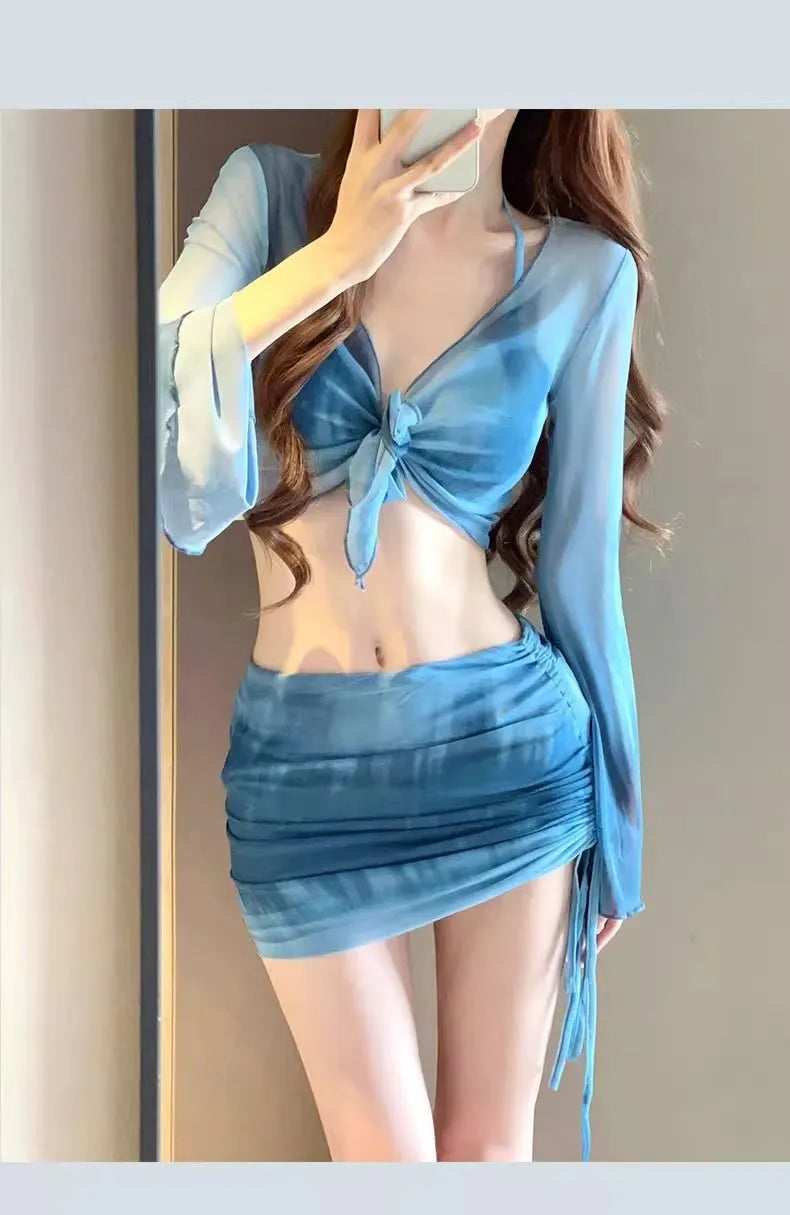 Blue women's high-waist bikini set with shirt, bra, underwear, and skirt on a mannequin.