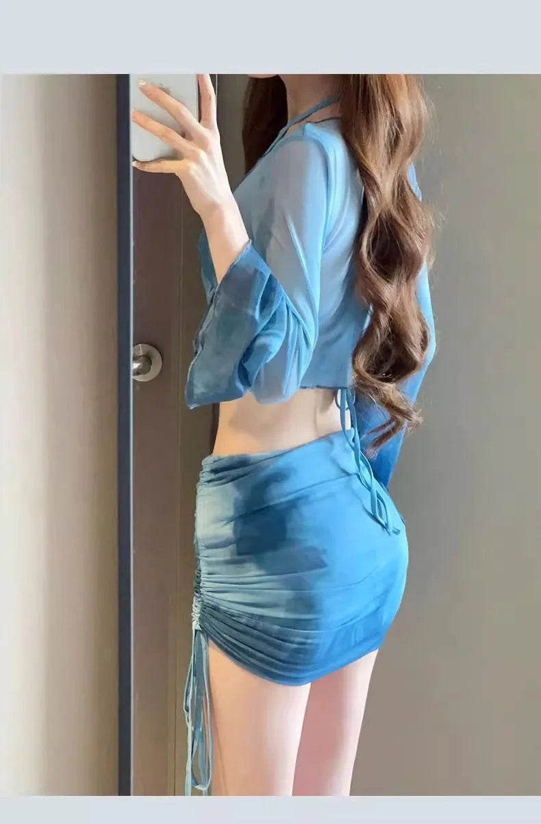 Blue women's high-waist bikini set with shirt, bra, underwear, and skirt on a mannequin.