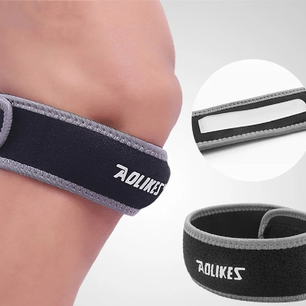 Black and grey patella retinaculum knee pad for sports protection