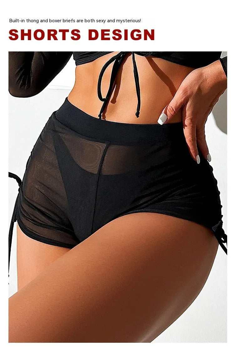 Black long sleeve women's bikini top and briefs, four-piece swimwear set.
