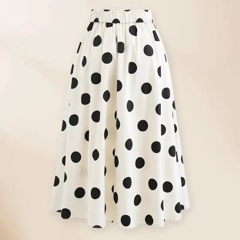 Women's black one-piece swimsuit with white round skirt and bow decoration for beach swimming