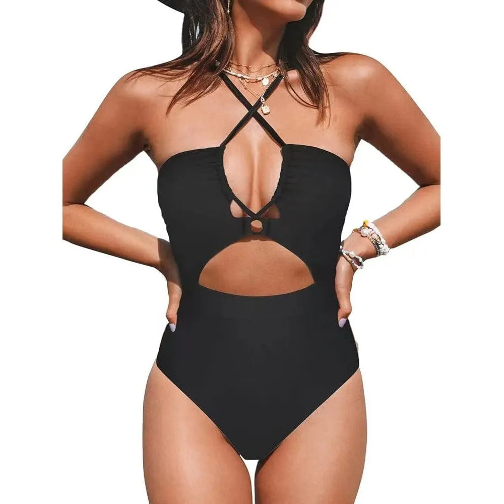 Women's black cross-back one-piece swimsuit with backless design