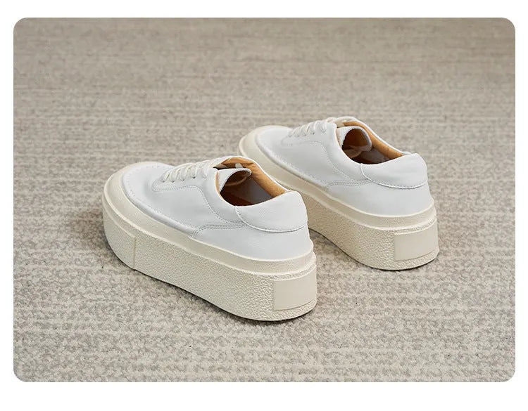 Women's black platform sports board shoes with embossed cowhide upper and lace-up closure