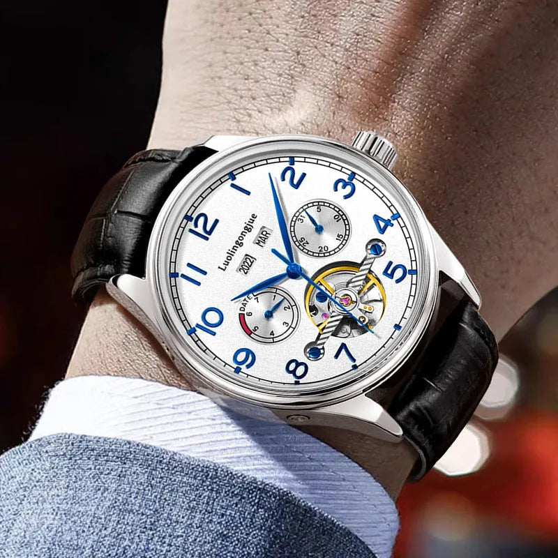 Men's business mechanical watch with stainless steel case, sapphire crystal, leather strap, hollow dial, and transparent caseback